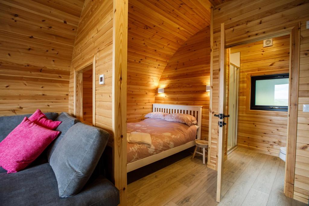 Postel nebo postele na pokoji v ubytování Shin View Pods