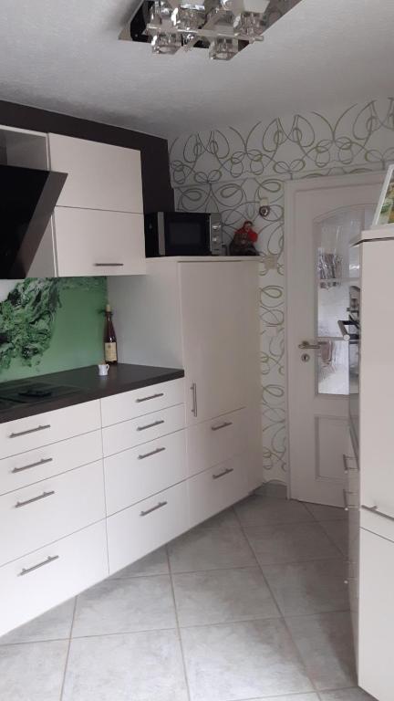 Kuchyň nebo kuchyňský kout v ubytování Altstadt Ferienhaus