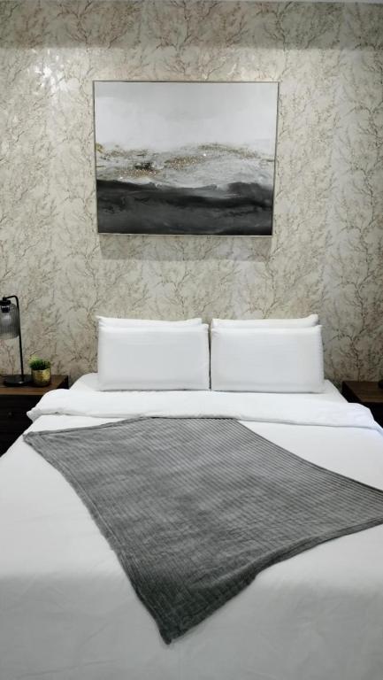 Cama o camas de una habitación en Mactan Reihenhaeuser