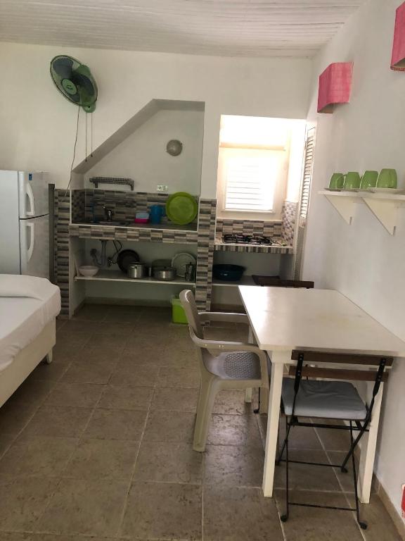 Kuchyň nebo kuchyňský kout v ubytování Hotel Casa Robinson