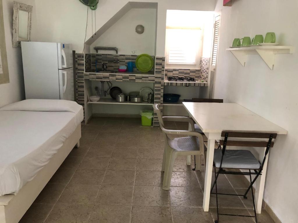 Kuchyň nebo kuchyňský kout v ubytování Hotel Casa Robinson