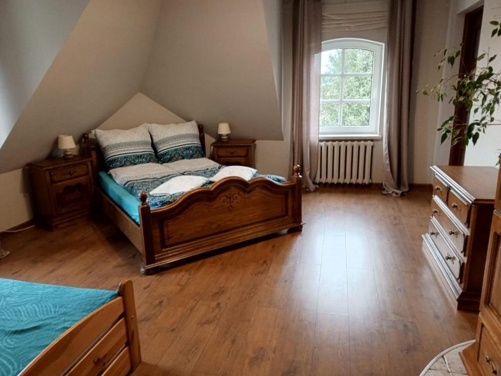Posteľ alebo postele v izbe v ubytovaní Familienurlaub 8 Personen Ferienhaus Polen Urlaub Insel Wolin Ostsee Ferienwohnung