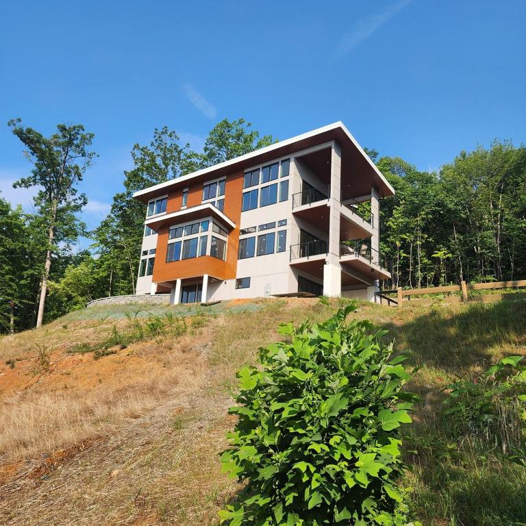 a large building on top of a hill at Altitude Adjustment in Nellysford