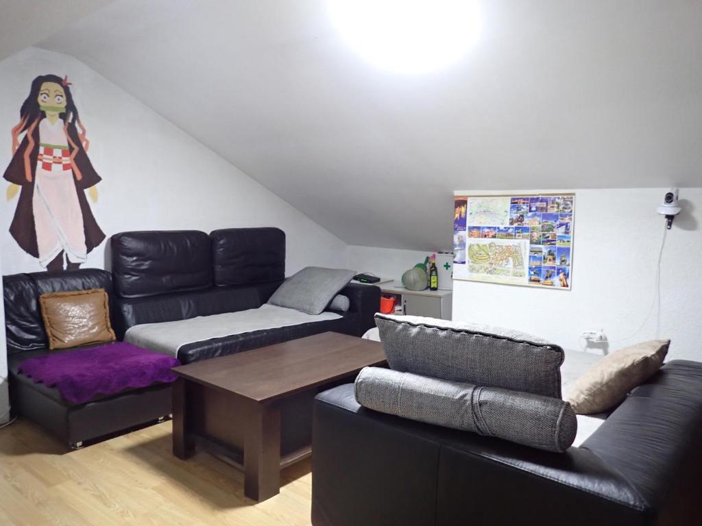 Гостиная зона в Historia Hostel