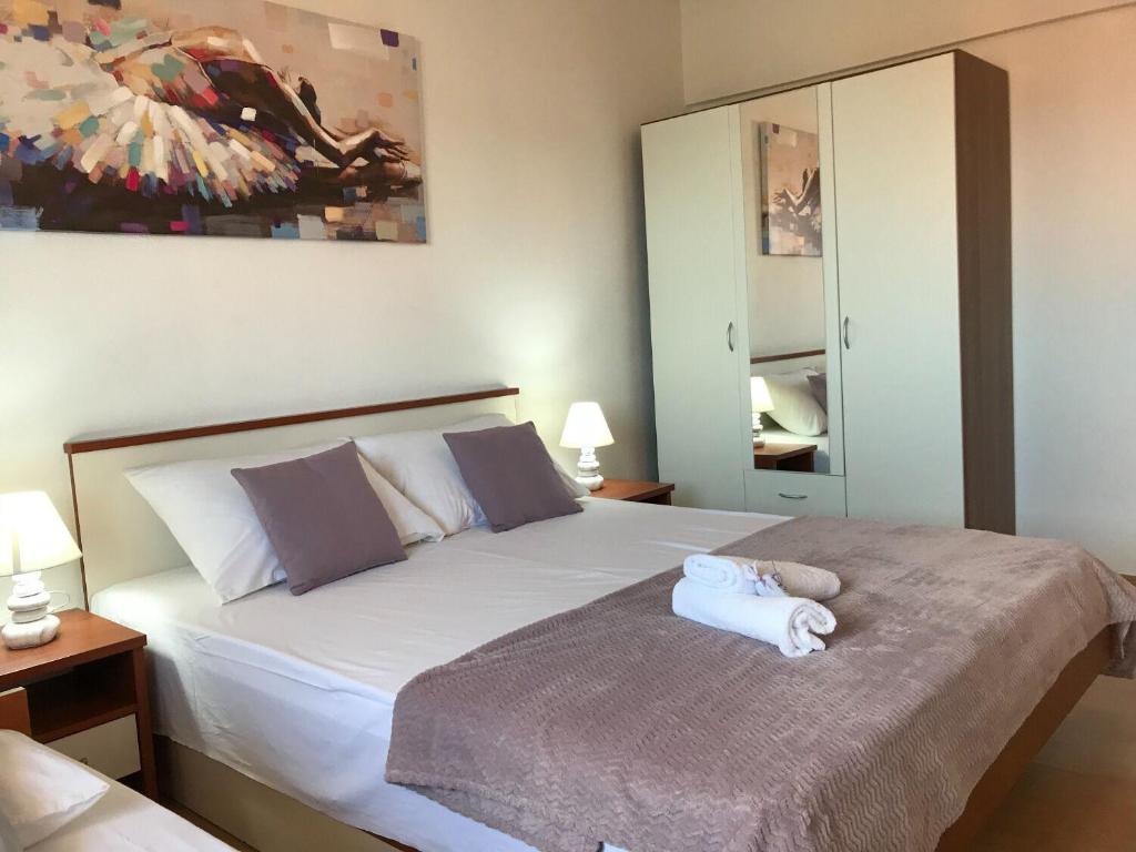 Posteľ alebo postele v izbe v ubytovaní Apartments Miroslava