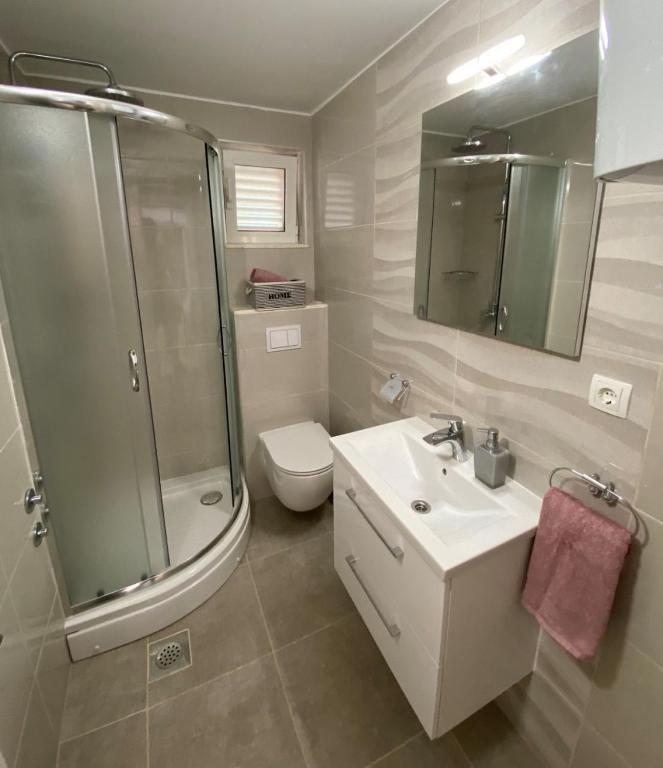 Kúpeľňa v ubytovaní Apartments Miroslava