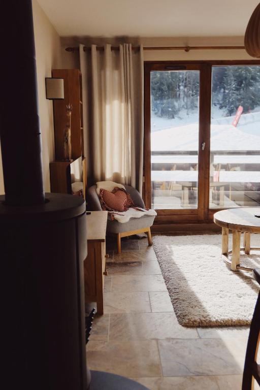 Posedenie v ubytovaní Appartement Courchevel la Tania