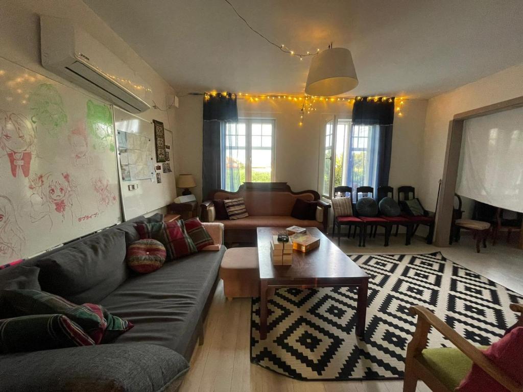 Posezení v ubytování Outintic House