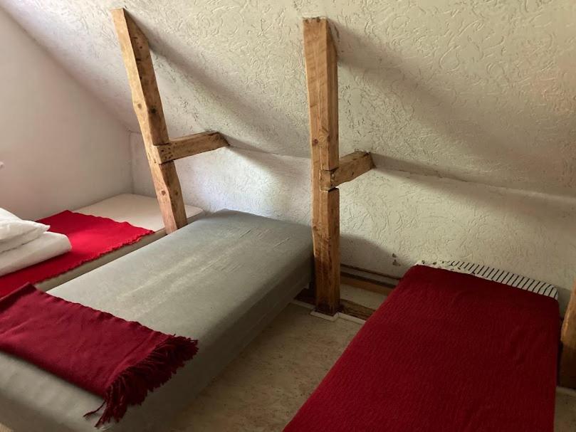 Postel nebo postele na pokoji v ubytování Outintic House