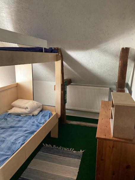 Postel nebo postele na pokoji v ubytování Outintic House