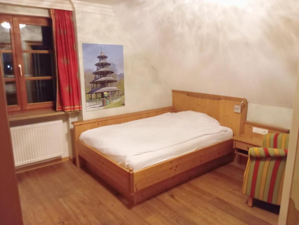 Postel nebo postele na pokoji v ubytování Eichen Schlössl