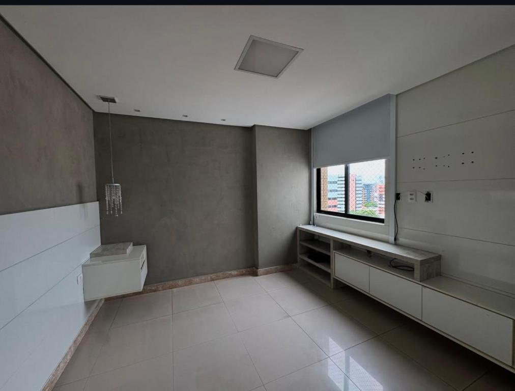 a large bathroom with a sink and a window at Casa de São Miguel in São Miguel dos Milagres