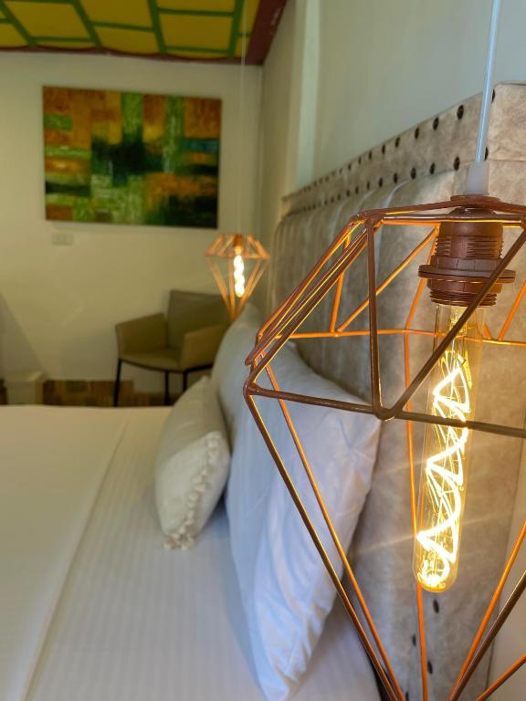 Postel nebo postele na pokoji v ubytování Dreams Hotel y Restaurante