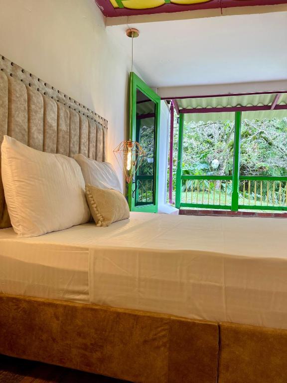 Postel nebo postele na pokoji v ubytování Dreams Hotel y Restaurante