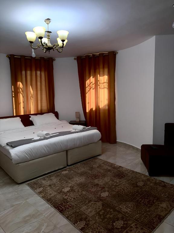 Postel nebo postele na pokoji v ubytování Marvel Hostel