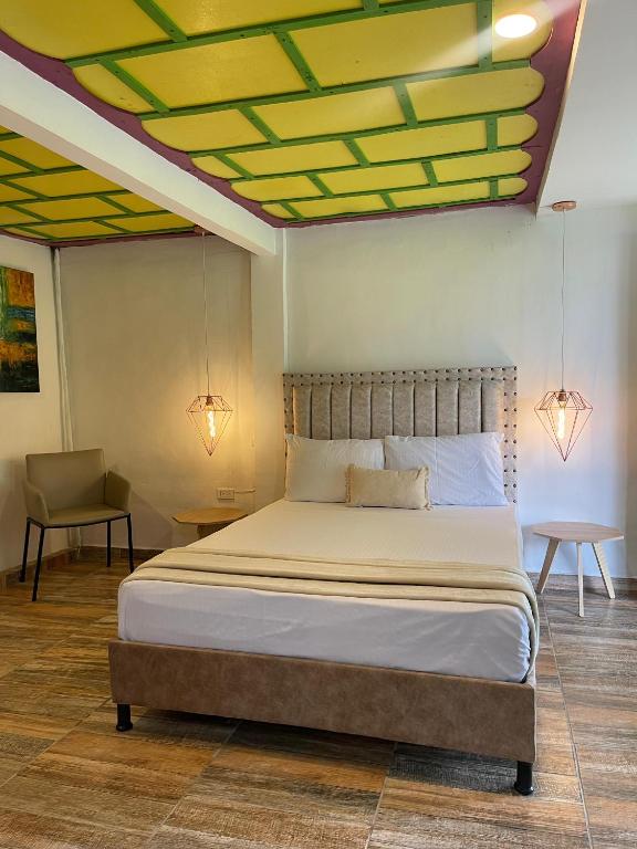 Postel nebo postele na pokoji v ubytování Dreams Hotel y Restaurante