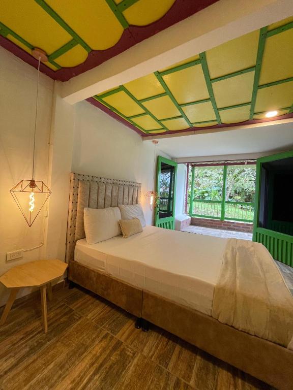 Postel nebo postele na pokoji v ubytování Dreams Hotel y Restaurante