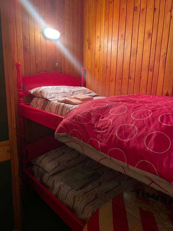 Postel nebo postele na pokoji v ubytování Casetta mia, Pian de Valli