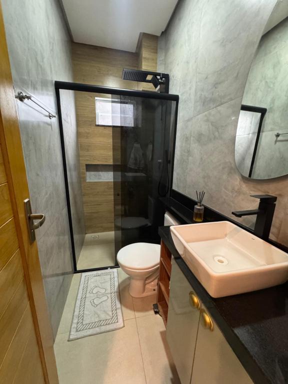 Koupelna v ubytování Flat Tapajós Alter 2 quartos, cozinha, climatizado, wifi 200mbps, estacionamento e self check-in