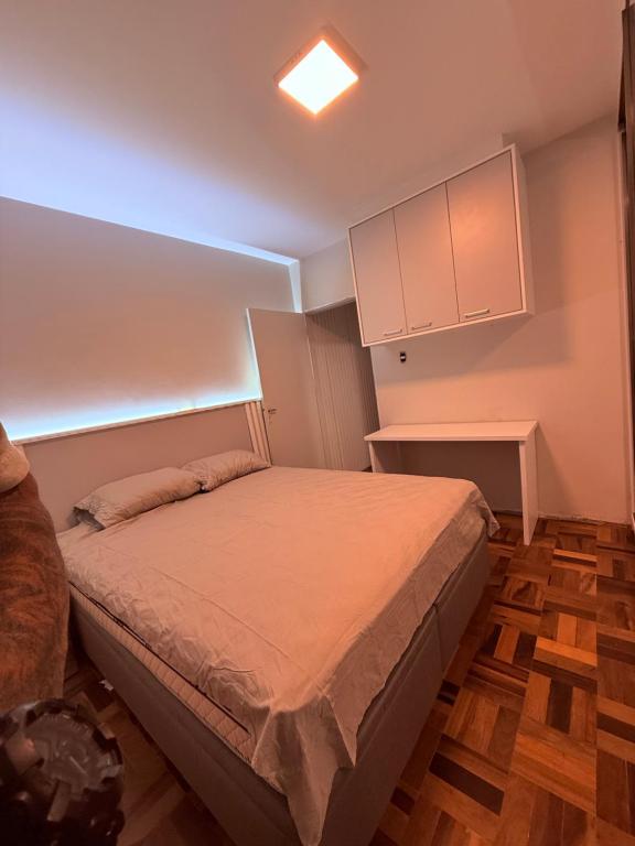 Postel nebo postele na pokoji v ubytování Doce APzinho