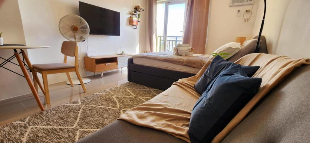 TV a/nebo společenská místnost v ubytování The Cozy Inn