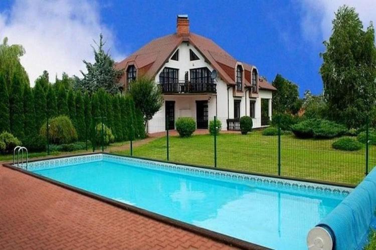 a house with a swimming pool in front of a house at Villa in Brenna near Ski Lifts in Brenna