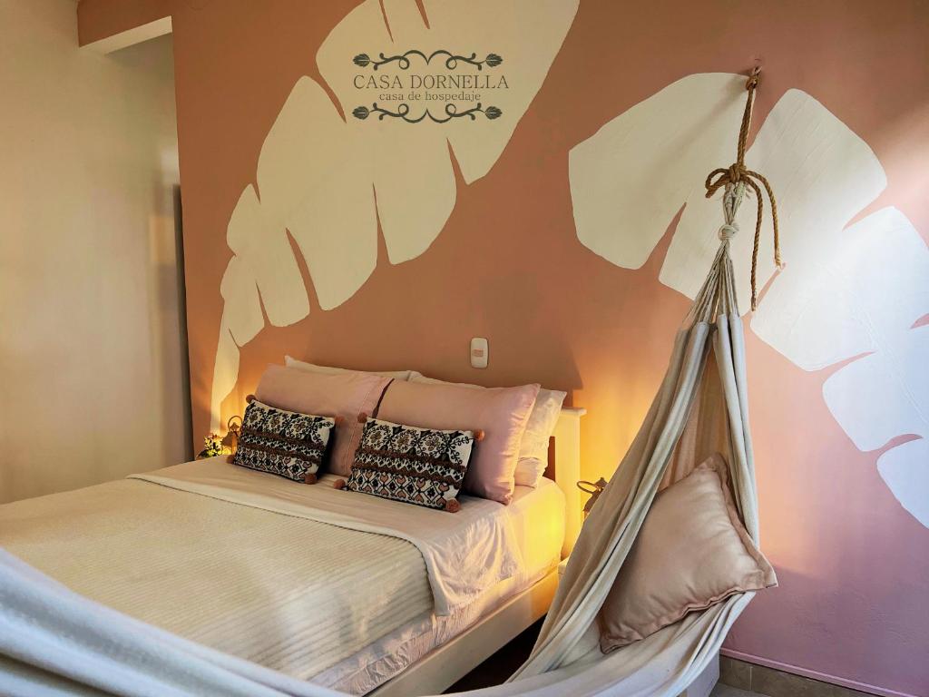 Postel nebo postele na pokoji v ubytování Casa Dornella - Casa de Hospedaje