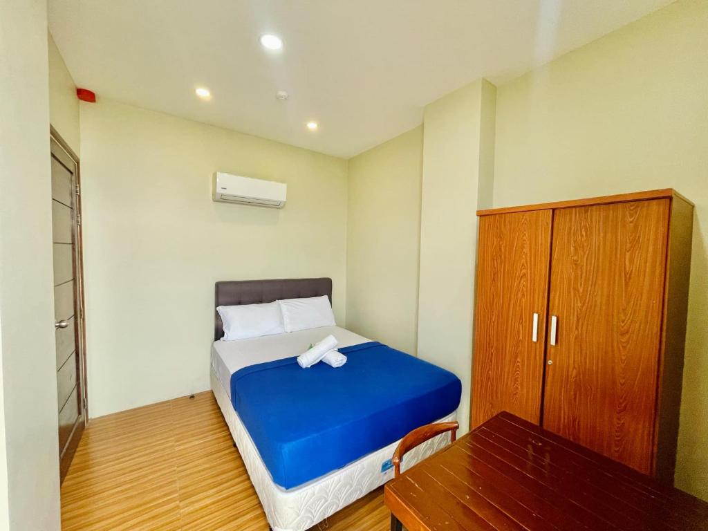 Postel nebo postele na pokoji v ubytování Hotel Elegant La Union