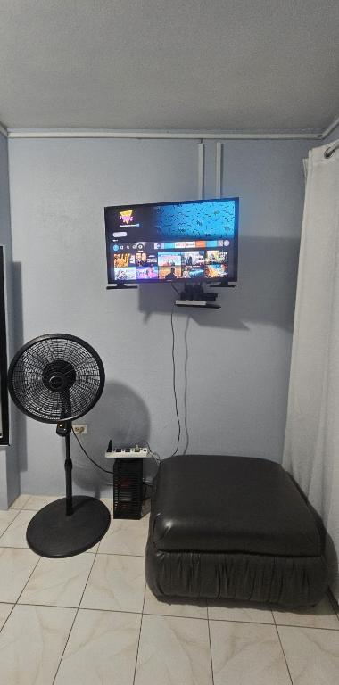 TV a/nebo společenská místnost v ubytování Sunny Space