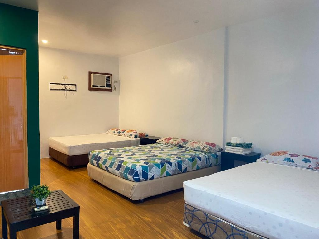 Postel nebo postele na pokoji v ubytování Seashore Inn