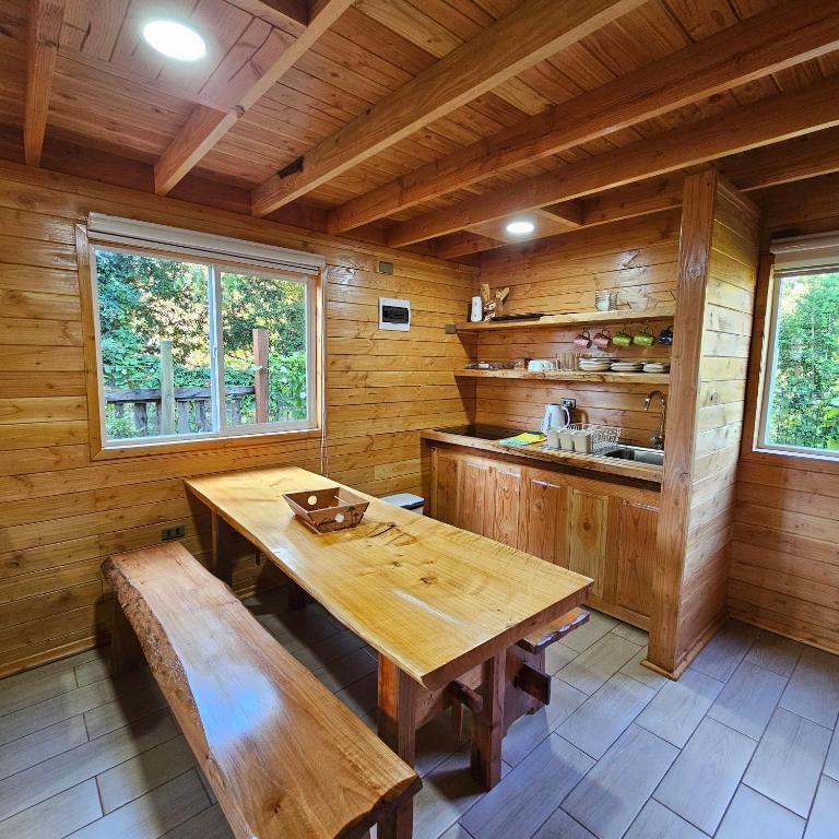 Kuchyň nebo kuchyňský kout v ubytování Cabaña Los Alerces