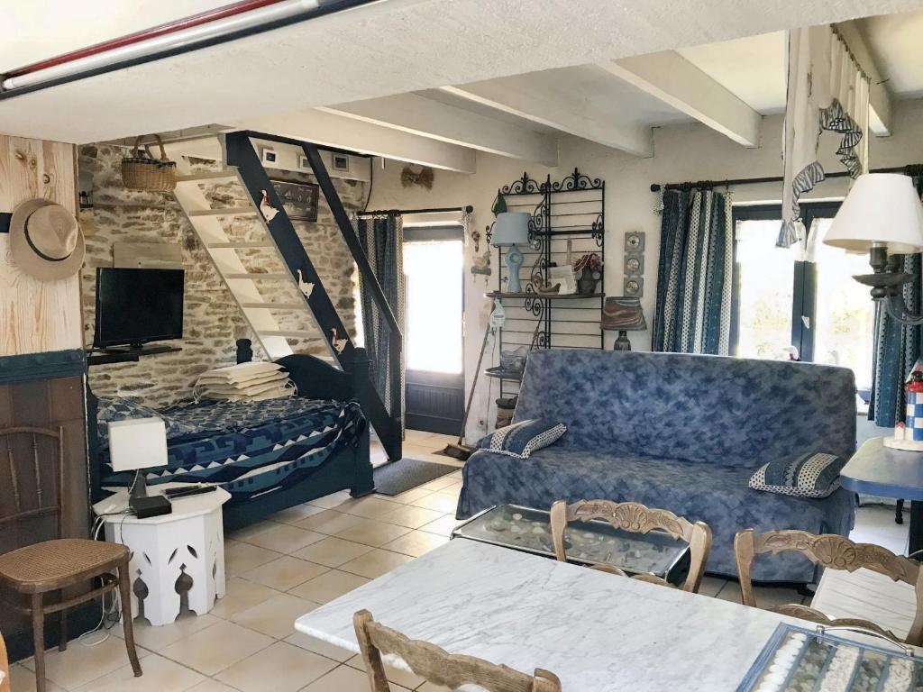Posedenie v ubytovaní Maison paisible à Moëlan-sur-Mer avec jardin et barbecue