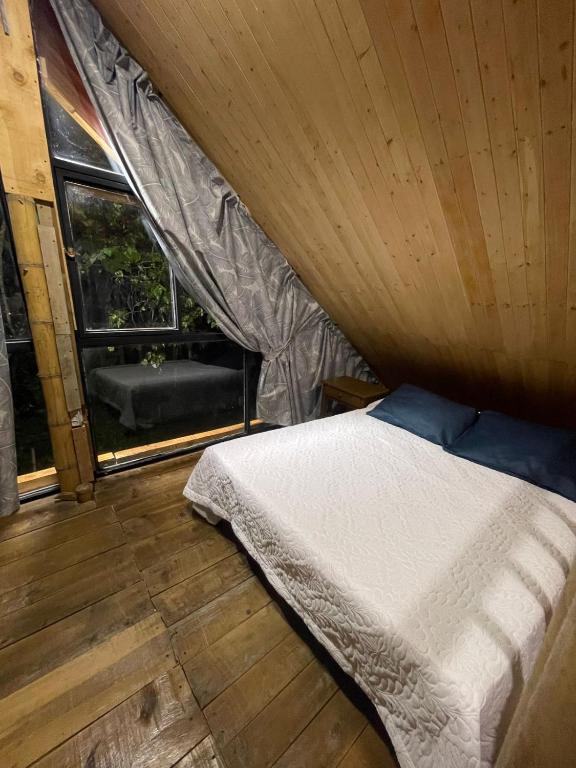 Giường trong phòng chung tại Glamping Manzara