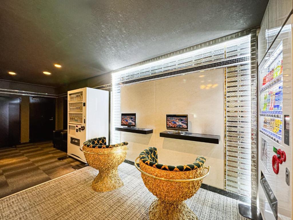 TV a/nebo společenská místnost v ubytování Hotel Gran Villa