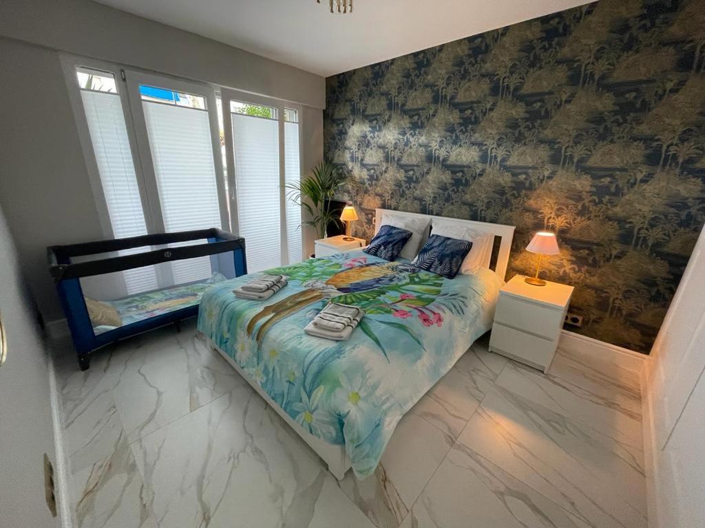 a bedroom with a large bed in a room at St George in Antibes