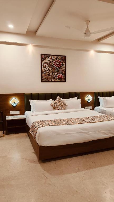 Rúm í herbergi á Soil to Soul Trinity Hotel - A Boutique Stay