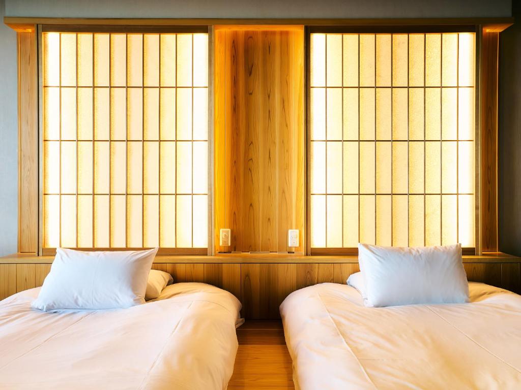 Postel nebo postele na pokoji v ubytování Setre Highland Villa Himeji