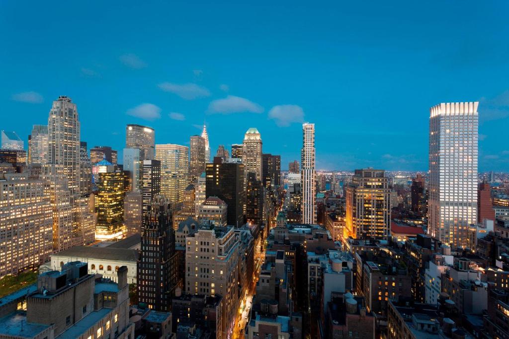 a view of a city skyline at night at Residence Inn by Marriott New York Manhattan/Times Square in New York