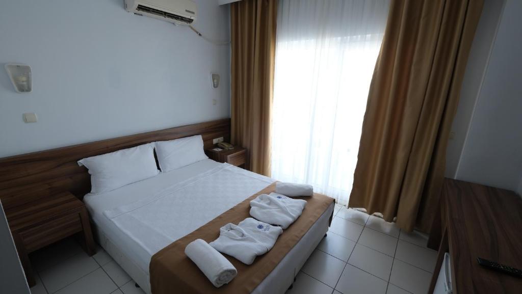 Postel nebo postele na pokoji v ubytování Eldar Garden Resort