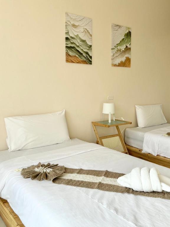Postel nebo postele na pokoji v ubytování Willow Pillow