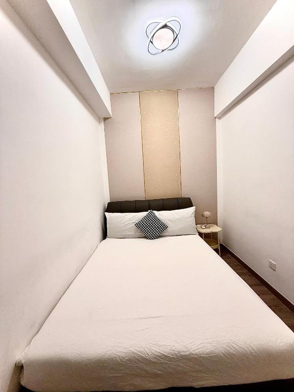 Postel nebo postele na pokoji v ubytování Agile TRX Luxury suite Bukit bintang