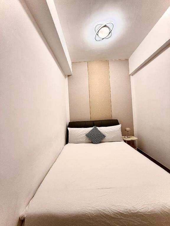 Postel nebo postele na pokoji v ubytování Agile TRX Luxury suite Bukit bintang