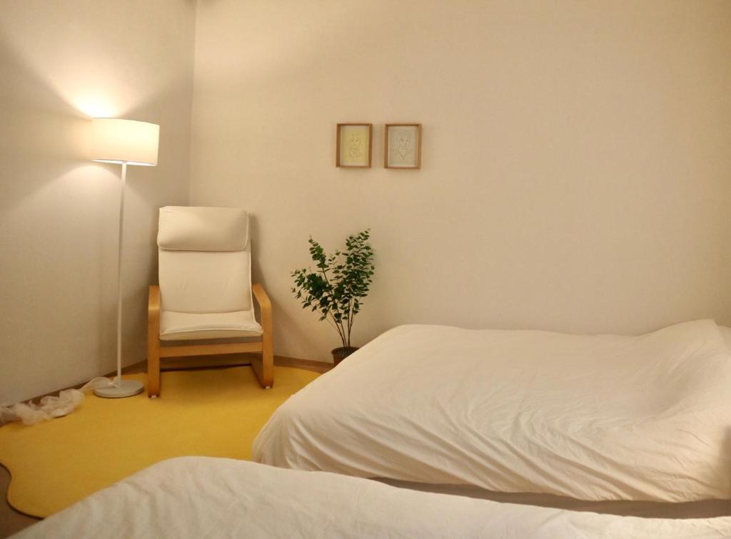 Postel nebo postele na pokoji v ubytování Slow Stay, #SK Hynix#5 minutes to Chungnam National University#10 minutes to Terminal#Hotel Bedding