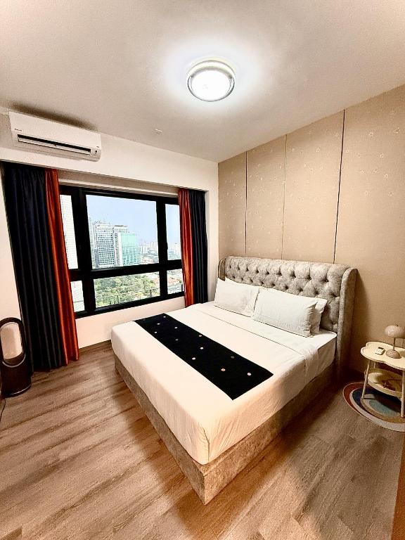 Postel nebo postele na pokoji v ubytování Agile TRX Luxury suite Bukit bintang
