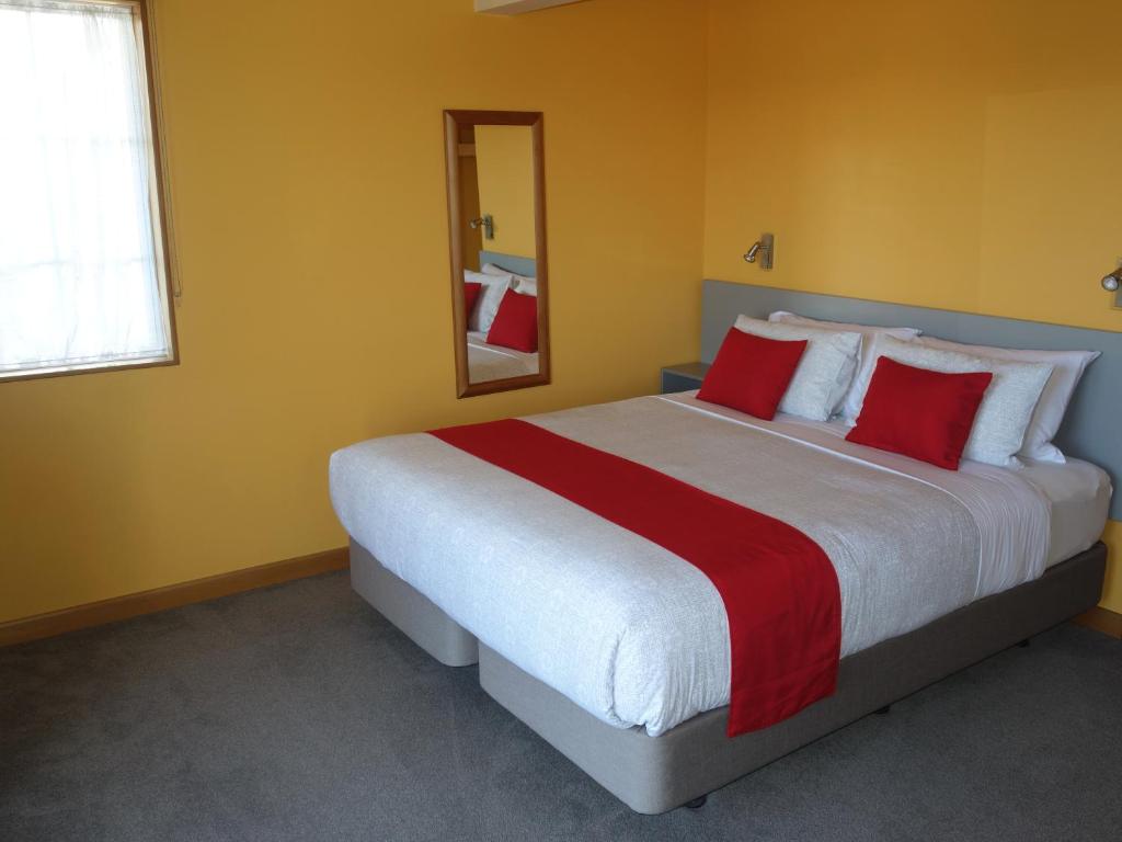 Postel nebo postele na pokoji v ubytování Beachside Villas Motel