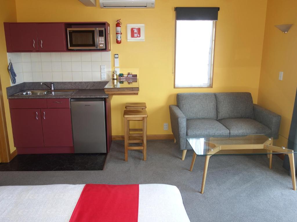Kuchyň nebo kuchyňský kout v ubytování Beachside Villas Motel
