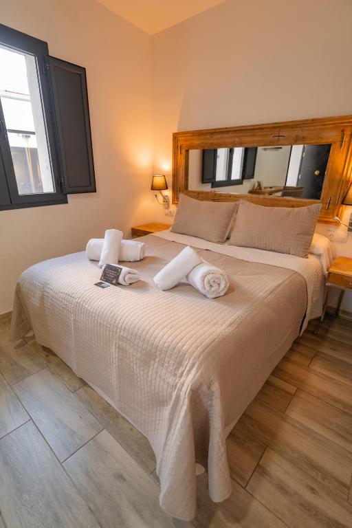 Posteľ alebo postele v izbe v ubytovaní Center Suites San Eloy