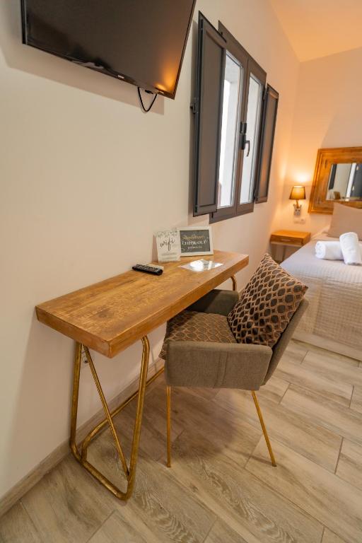 Posteľ alebo postele v izbe v ubytovaní Center Suites San Eloy