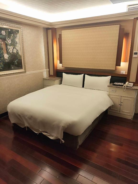 Postel nebo postele na pokoji v ubytování GAWA Hotel