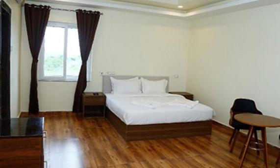 Postel nebo postele na pokoji v ubytování Saga Hotels And Resorts